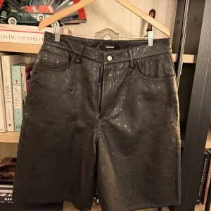 Nahmias Star-Embossed Lamb-Leather Carpenter Shorts