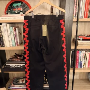 Santo Studio Logo-Trim Trousers