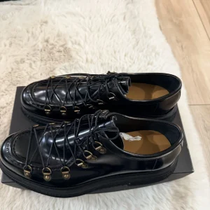 Black Leather Cage-Laced Shoes